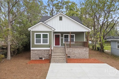 This stunning new construction 4BR/2BA custom crafted bungalow - photo 1