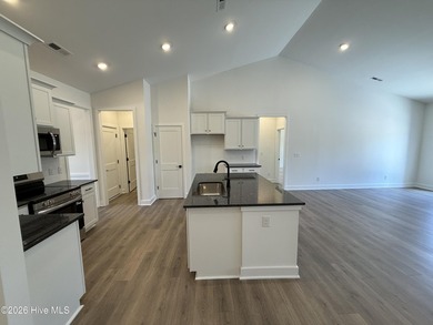 Welcome to Wood Creek Landing in Leland! THIS HOME WAS JUST - photo 7