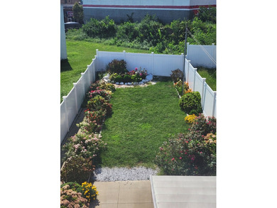 Don't miss out on this stunning two-family brick house. The - photo 11