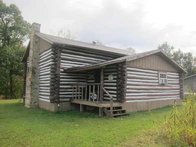 Turnkey, furnished, and unforgettable-this two-story log cabin - photo 7