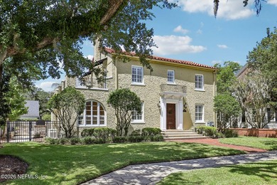 This exquisite block and stucco Mediterranean style home was - photo 3