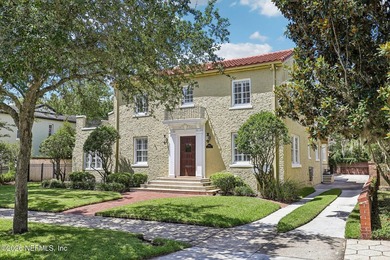 This exquisite block and stucco Mediterranean style home was - photo 4