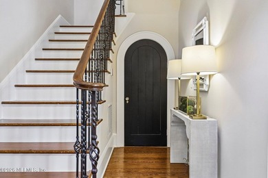 This exquisite block and stucco Mediterranean style home was - photo 6
