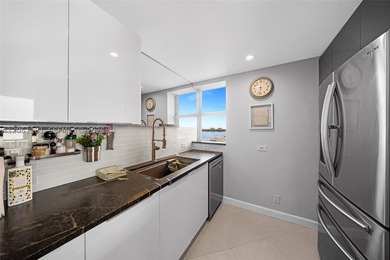 Incredible value in Blue Bay Tower! This high-floor 3-bed, 2 - photo 3