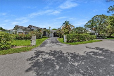 Welcome to a rare lakefront estate in the exclusive, guard-gated - photo 1