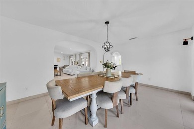 Welcome to a rare lakefront estate in the exclusive, guard-gated - photo 4