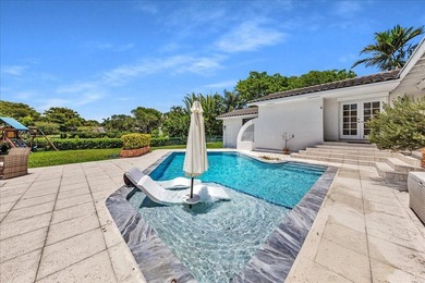 Welcome to a rare lakefront estate in the exclusive, guard-gated - photo 5