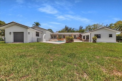 Welcome to a rare lakefront estate in the exclusive, guard-gated - photo 6
