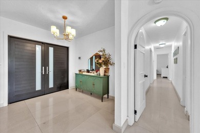Welcome to a rare lakefront estate in the exclusive, guard-gated - photo 7
