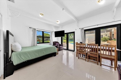 Welcome to a rare lakefront estate in the exclusive, guard-gated - photo 9