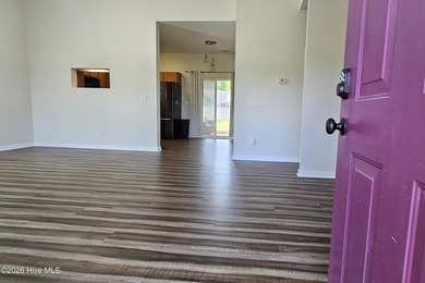 Welcome home to this charming 3-bedroom, 2-bath property located - photo 2