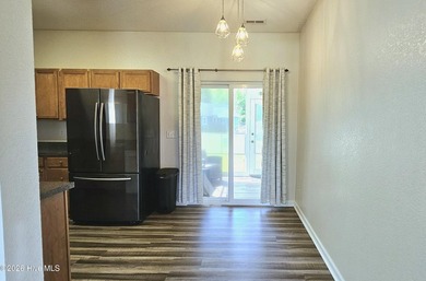 Welcome home to this charming 3-bedroom, 2-bath property located - photo 7