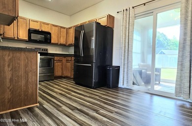 Welcome home to this charming 3-bedroom, 2-bath property located - photo 9