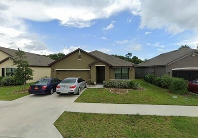Step into this inviting 3-bedroom, 2-bath home located in the - photo 1