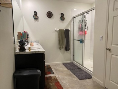 Step into this inviting 3-bedroom, 2-bath home located in the - photo 10