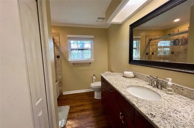 Motivated Seller! Welcome home to this inviting 2 bed 1.5 bath - photo 9