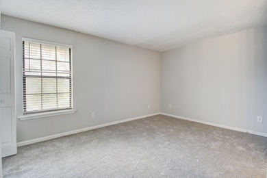 Move in ready two bedroom townhouse featuring a cozy fireplace - photo 16