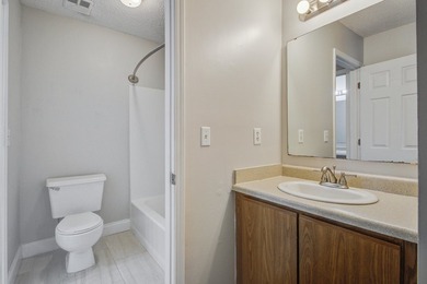 Move in ready two bedroom townhouse featuring a cozy fireplace - photo 17