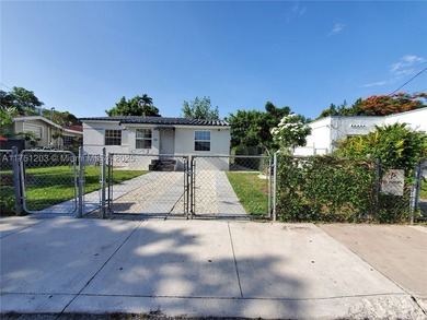 Location ! This Income Property, located on one of Wynwood's - photo 3