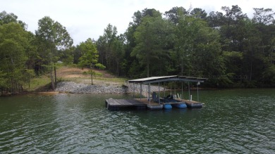 Enjoy breathtaking sunset views and 193 feet of year-round water - Lake Lot For Sale in Double Springs, Alabama