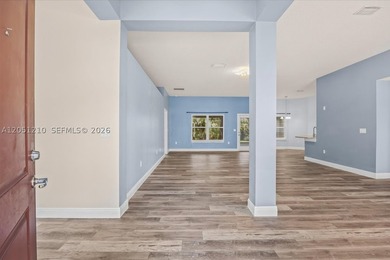 Beautifully maintained 4-bedroom, 3-bath home featuring a - photo 3