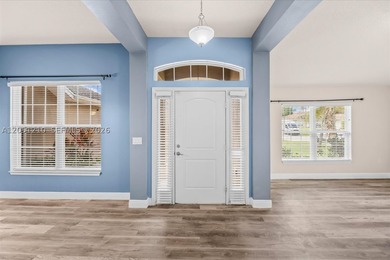 Beautifully maintained 4-bedroom, 3-bath home featuring a - photo 4