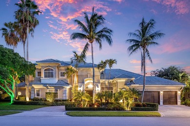 Tucked within the prestigious enclave of Boca Bay Colony, this - photo 3