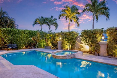Tucked within the prestigious enclave of Boca Bay Colony, this - photo 4