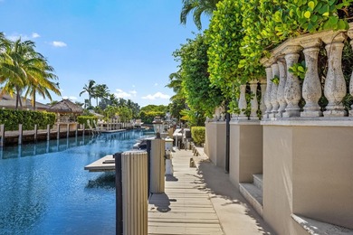 Tucked within the prestigious enclave of Boca Bay Colony, this - photo 6
