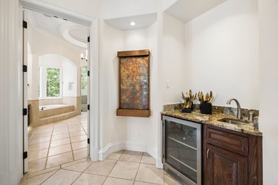 Situated in a prestigious Southlake cul-de-sac, this gated - photo 18