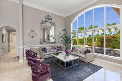 Tucked within the prestigious enclave of Boca Bay Colony, this - photo 9