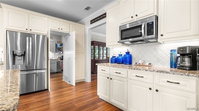 This beautifully crafted 4-bedroom, 3.5-bath brick estate sits - photo 31