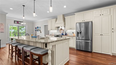 This beautifully crafted 4-bedroom, 3.5-bath brick estate sits - photo 38