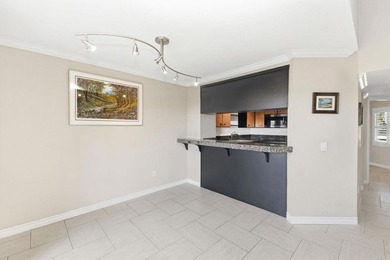Enjoy stunning harbor and airport views from the living room - photo 11
