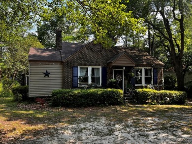 This is a beautiful vintage cottage home, in a great location - Lake Home Sale Pending in Sumter, South Carolina