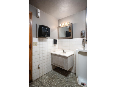 This turnkey opportunity features a premier city establishment - photo 10