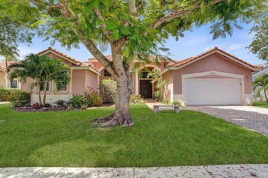 Nestled on a tranquil canal in the gated community of Spring - photo 1