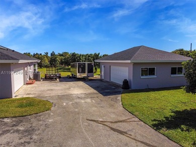 5-acre fully fenced property featuring a gated driveway with two - photo 3