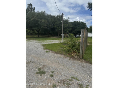 This lot has beautiful oaks on it, and sits across from the lake - photo 3