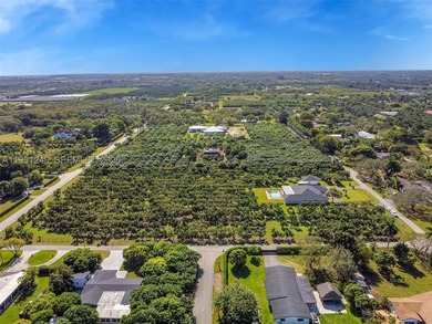 5-acre fully fenced property featuring a gated driveway with two - photo 8