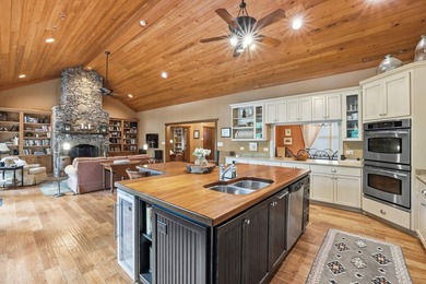 This 3,030-square-foot, 4-bedroom, 4-bathroom lake house with - photo 11