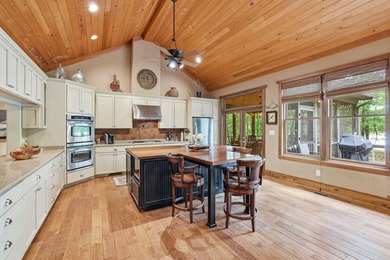 This 3,030-square-foot, 4-bedroom, 4-bathroom lake house with - photo 12