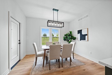 This beautiful custom-built home in The Coves features 3 - photo 15