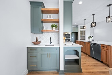 This beautiful custom-built home in The Coves features 3 - photo 16