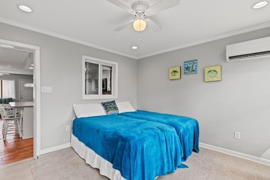 Waterfront with stunning views, a rare 3-bedroom, 3.5-bath with - photo 17