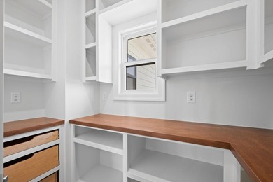 This beautiful custom-built home in The Coves features 3 - photo 17