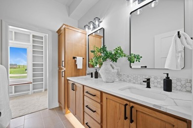 This beautiful custom-built home in The Coves features 3 - photo 20