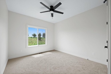 This beautiful custom-built home in The Coves features 3 - photo 23