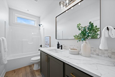 This beautiful custom-built home in The Coves features 3 - photo 24