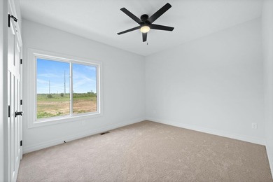 This beautiful custom-built home in The Coves features 3 - photo 25